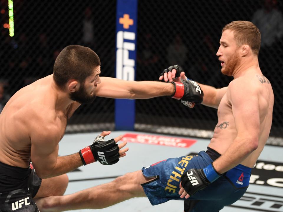 Khabib Nurmagomedov (left) in his final bout, against Justin Gaethje (Zuffa LLC via Getty Images)