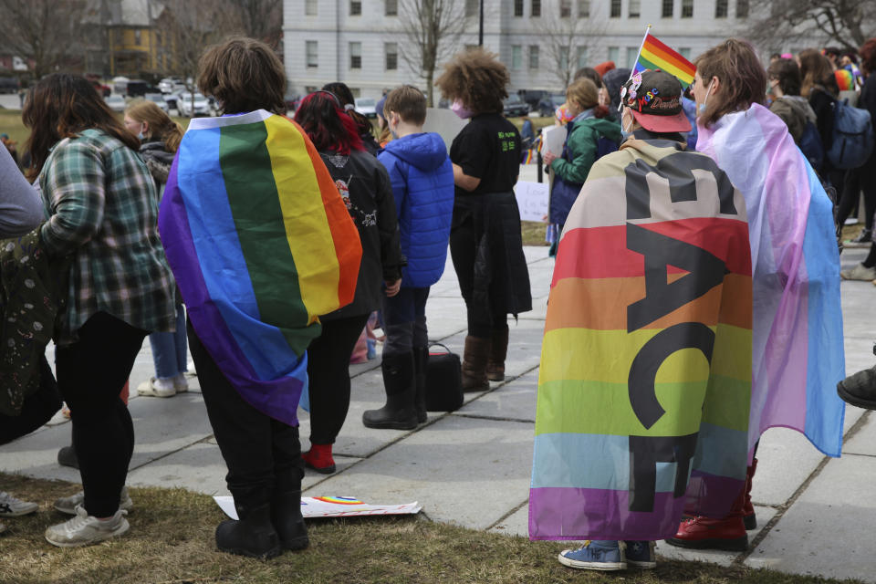 Hundreds of people gather on the lawn of the Vermont Statehouse in Montpelier, on Friday March 31, 2023 in support of transgender rights. The Vermont rally is one of many being held across the country on Friday. The rallies come at a time when Republicans in some state legislatures across the country are considering hundreds of separate bills that would limit transgender rights. (AP Photo/Wilson Ring)