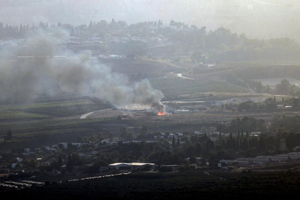 Smoke billowed after a hit from a rocket fired from southern Lebanon over the Upper Galilee region in northern Israel on July 8, 2024.