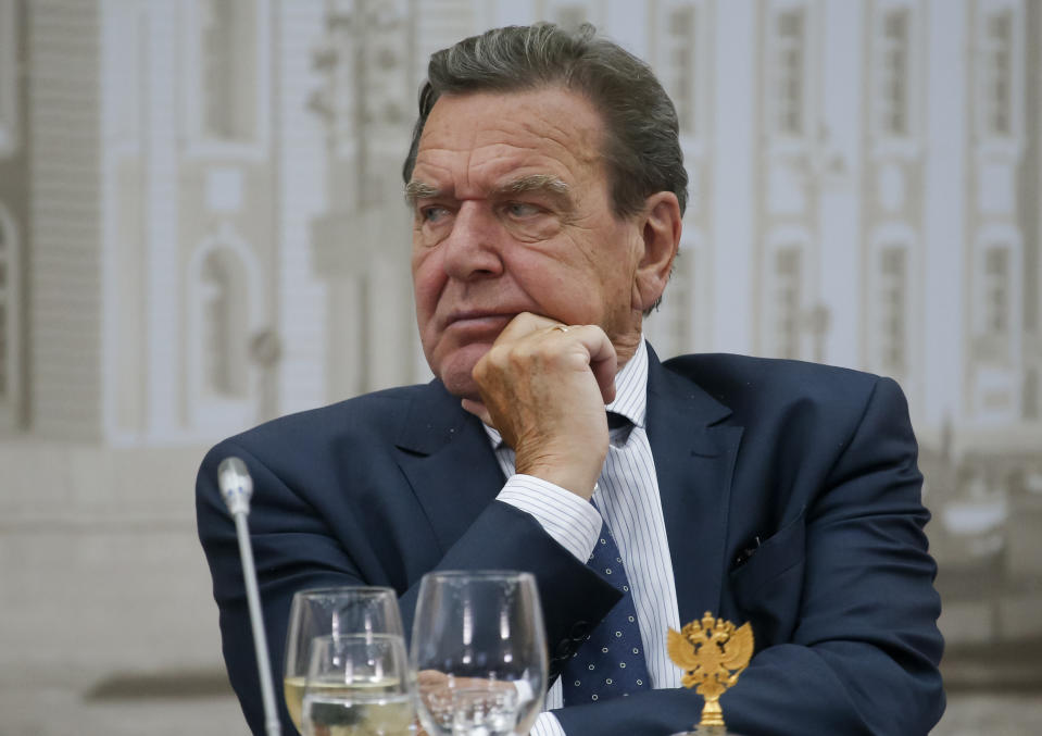 FILE - Former German Chancellor Gerhard Schroeder attends a meeting of Russian President Vladimir Putin with chief executives of international companies at the St. Petersburg International Economic Forum in St. Petersburg, Russia, Friday, June 17, 2016. Gerhard Schroeder left the German chancellery after a narrow election defeat in 2005 with an ambitious overhaul of the country’s welfare state beginning to kick in and every chance of becoming a respected elder statesman. Fast-forward to last week: German lawmakers agreed to shut down Schroeder’s taxpayer-funded office, the European Parliament called for him to be sanctioned, and his own party set a mid-June hearing on applications to have him expelled. Schroeder’s association with the Russian energy sector turned the 78-year-old into a political pariah in Germany after the invasion of Ukraine. (AP Photo/Dmitry Lovetsky, File)