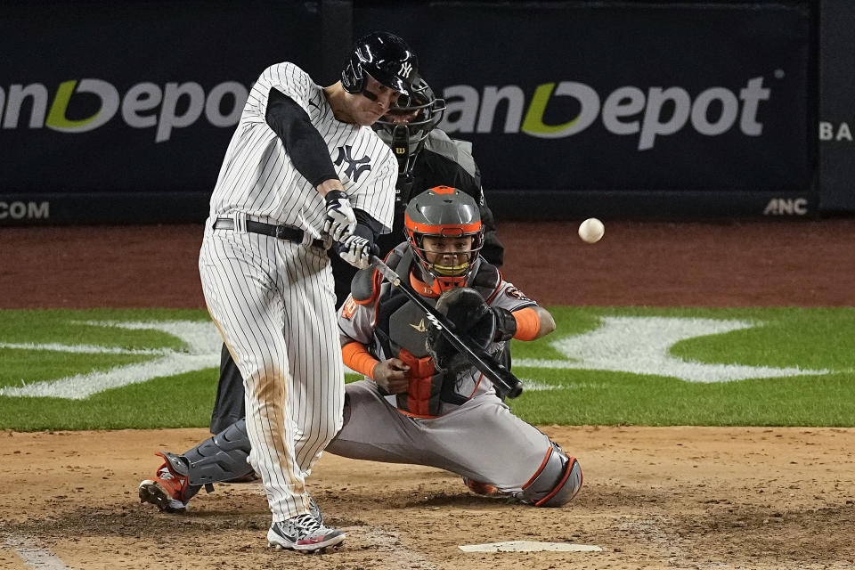 New York Yankees Anthony Rizzo connects for an RBI base hit against the Houston Astros during the fourth inning of Game 4 of an American League Championship baseball series, Sunday, Oct. 23, 2022, in New York. (AP Photo/Julia Nikhinson)