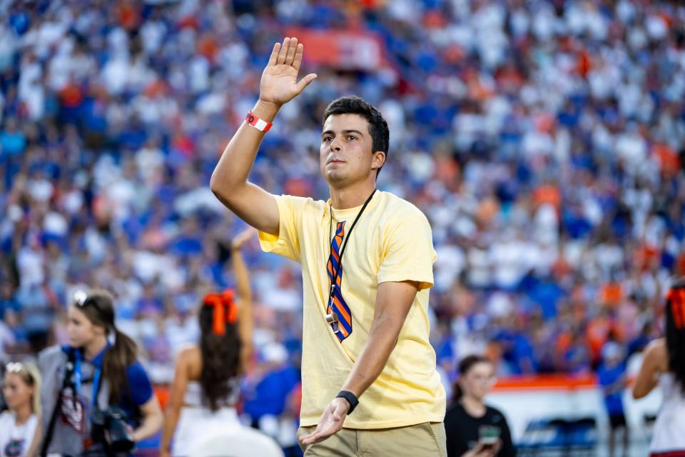 Fred Biondi won the 2023 NCAA individual championship for the University of Florida. Later that fall, he was an honorary "Mr. Two Bits" at a Gators home football game.