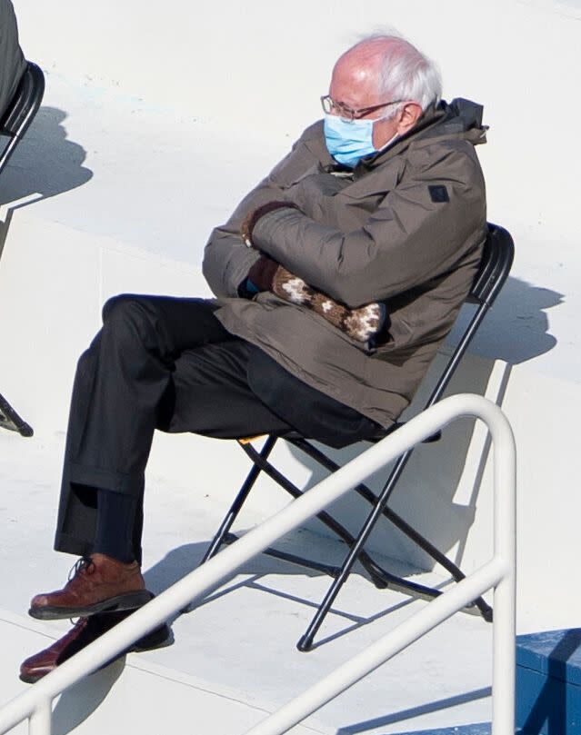 Sen. Bernie Sanders (I-Vt.) and his oversized mittens became unwitting stars of President Joe Biden&rsquo;s inauguration. (Photo: ASSOCIATED PRESS)