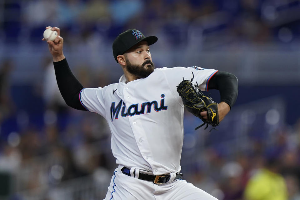 Miami Marlins' Pablo Lopez delivers a pitch during the first inning of a baseball game against the New York Mets, Sunday, July 31, 2022, in Miami. (AP Photo/Wilfredo Lee)