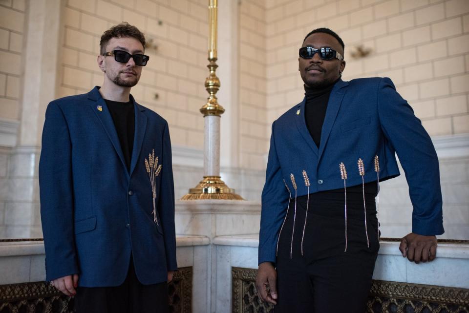 Jeffrey Kenny and Andrii Hutsuliak, members of the Tvorchi duo, pose for a portrait in the central Ukrainian railway station on April 28, 2023 in Kyiv, Ukraine (Getty Images)