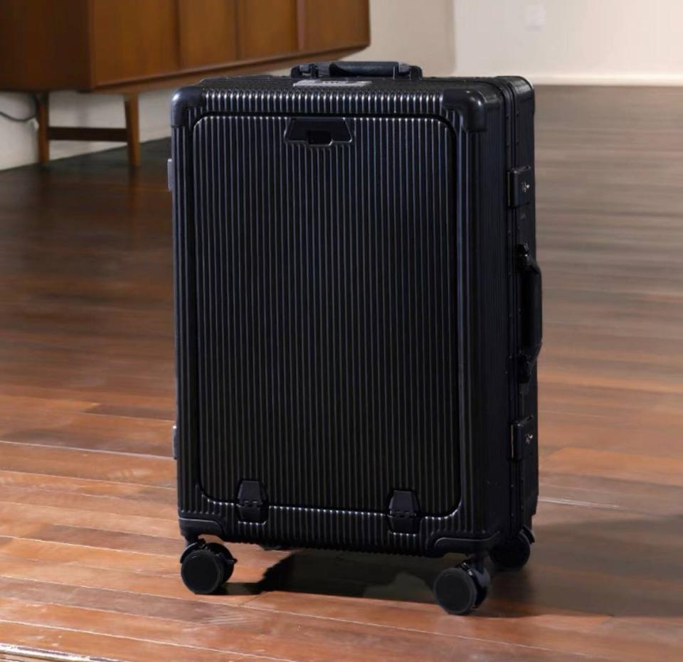 KKPL Versatile Aluminum Frame Luggage with USB Charging Port. (PHOTO: Robinsons Singapore)