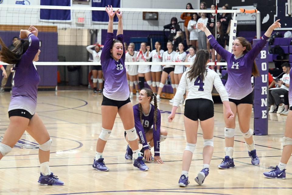 At the end of five sets against Old Rochester the Bourne team celebrates their victory.