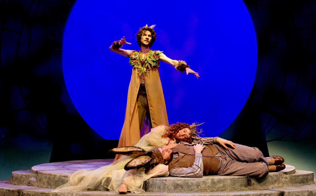 Ben Sanford (Oberon), stands over Nora Shearer (Titania) and Nathan Frewen (Nick Bottom) in the Otterbein Department of Theatre & Dance production of “A Midsummer Night’s Dream.”