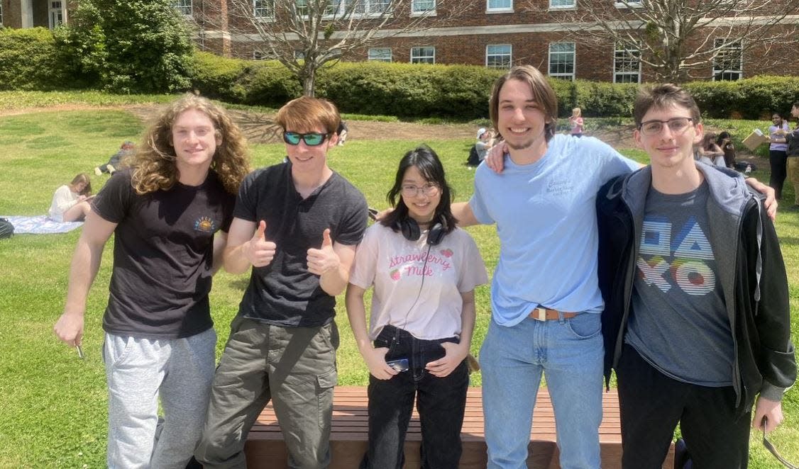 Clemson University students were posing for photos before Monday afternoon's partial solar eclipse on April 8, 2024.