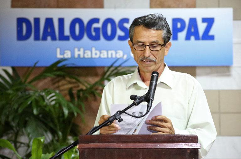 Picture released by the FARC-EP delegation shows FARC commander Walter Mendoza reading a statement during peace talks with the Colombian government in Havana, Cuba, on June 3, 2015