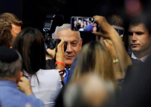 With a hoarse voice and appearing haggard after days of intense campaigning, Israeli PM Benjamin Netanyahu said he was prepared for negotiations to form a 'strong Zionist government'