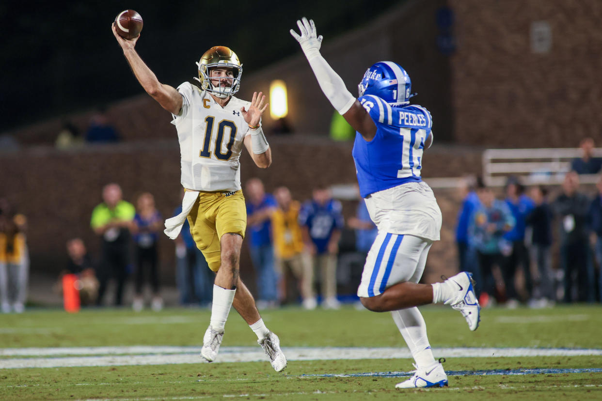 Notre Dame quarterback Sam Hartman made several big plays to lead a clutch 95-yard drive in the final minutes against Duke on Saturday. (Photo by Nicholas Faulkner/Icon Sportswire via Getty Images)