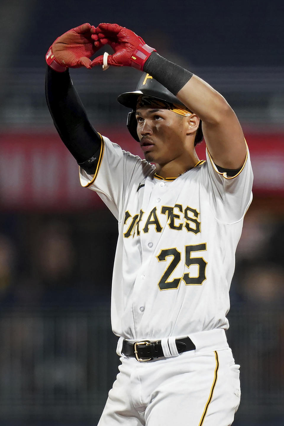 Pittsburgh Pirates' Endy Rodriguez gestures after hitting a double against the Washington Nationals during the fifth inning of a baseball game in Pittsburgh, Tuesday, Sept. 12, 2023. (AP Photo/Matt Freed)