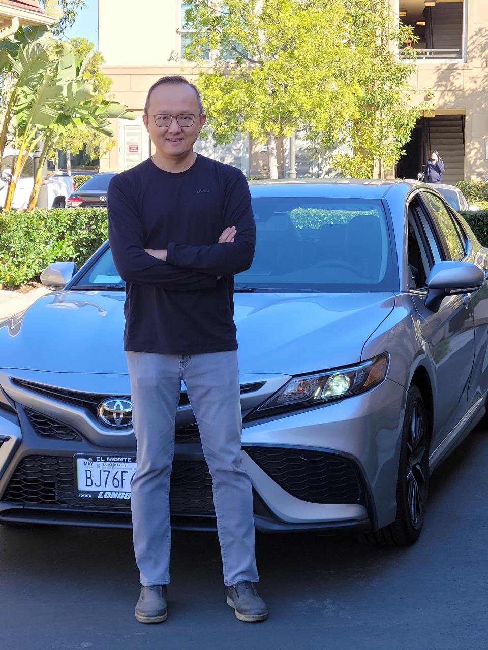 Eric Young bought a 2021 Toyota Camry for about $27,000.