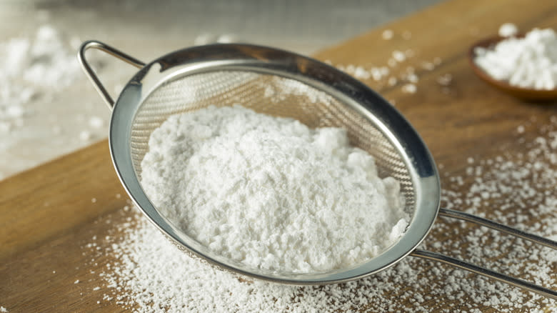 Powdered sugar in sieve