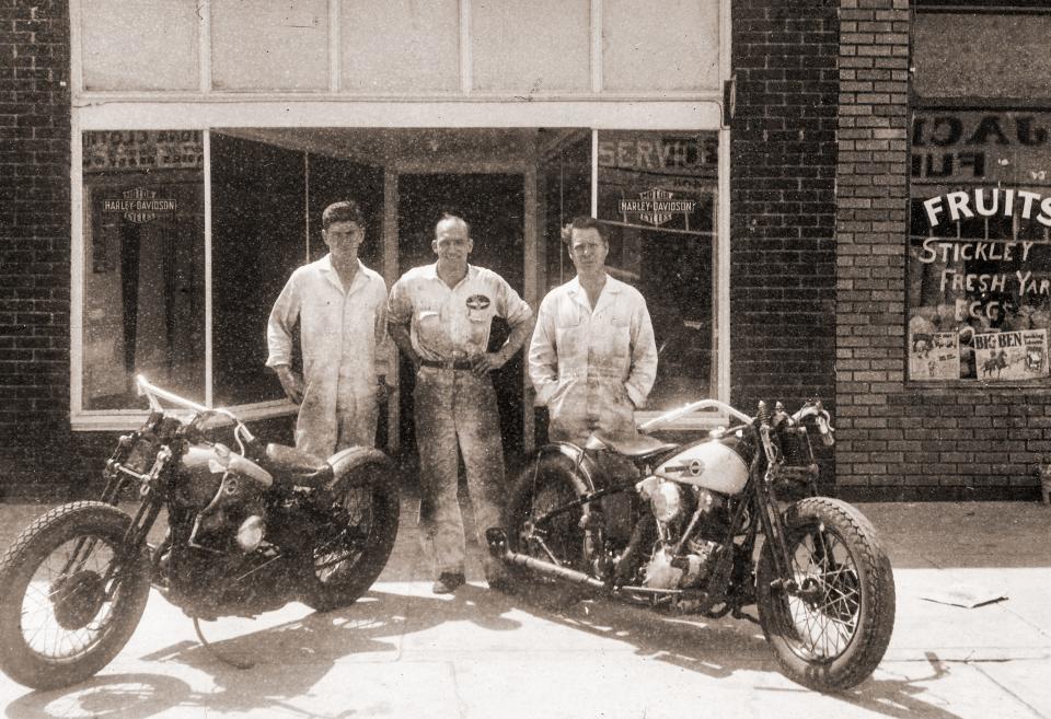 Lig Birch, left, and two mechanics in front of the Harley-Davidson motorcycle shop on Beach Street. "The picture is most likely from 1939 to 1940," Langford wrote.