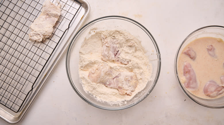 dredging chicken in flour