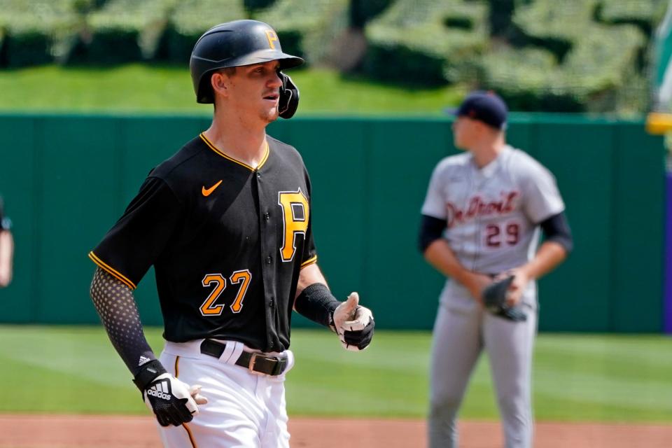 Pittsburgh Pirates' Kevin Newman (27) runs home after hitting a two-run home run off Detroit Tigers starting pitcher Tarik Skubal (29) during the first inning of a baseball game in Pittsburgh, Monday, Sept. 6, 2021.