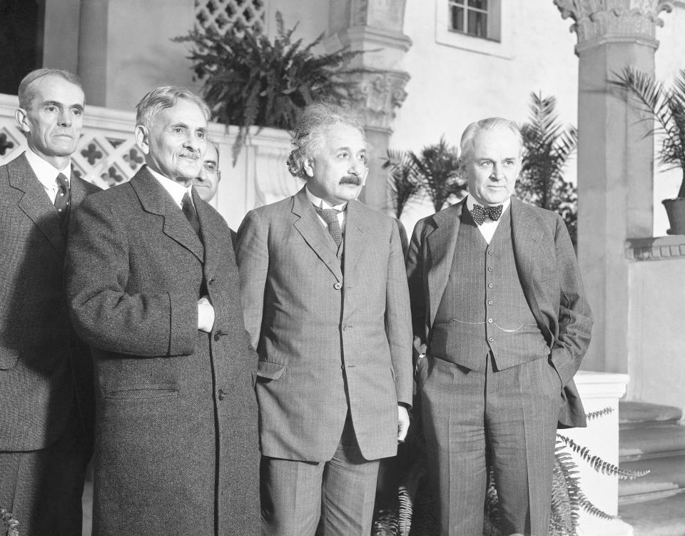 FILE - Walter S. Adams, astronomer and director of the Mt. Wilson Carnegie observatory; Dr. Albert A. Michelson, formerly of Chicago University, who measured the speed of light; Dr. Albert Einstein, famed for his theory of relativity; and Dr. Robert A. Millikan, president of the California Institute and discoverer of the cosmic ray pose for a photo, in Pasadena, Calif., on Jan. 10, 1931. Most winners are proud and humbled by joining the pantheon of Nobel laureates from Albert Einstein to Mother Teresa. (AP Photo, File)