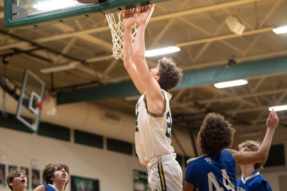 Pennfield senior Brenden Duncan takes a shot during a game against Plainwell at Pennfield High School on Tuesday, Jan. 24, 2023.