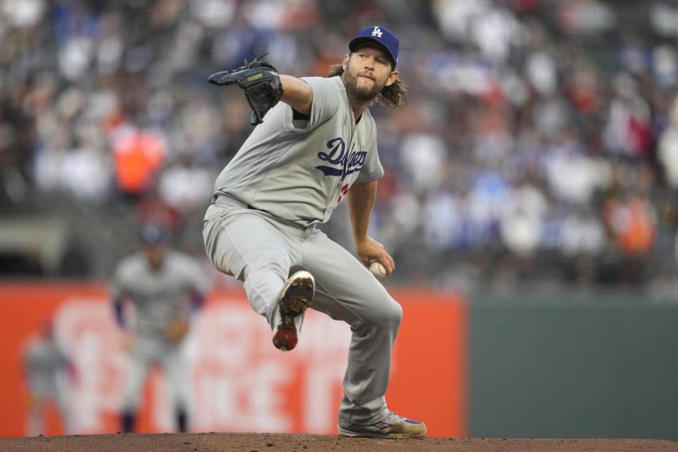 Los Angeles Dodgers pitcher Clayton Kershaw works against the San Francisco Giants on Sept. 30, 2023.