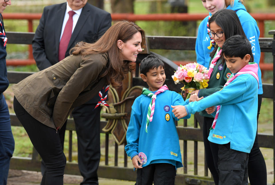 Kate Middleton, Duchess of Cambridgevisits the Scouts headquarters at Gilwell Park to learn more about the organization’s new pilot to bring Scouting to younger children, the visit will also celebrate the site’s 100th anniversary year at Gilwell Park on March 28, 2019 in Epping, England. (Photo: Karwai Tang/WireImage)