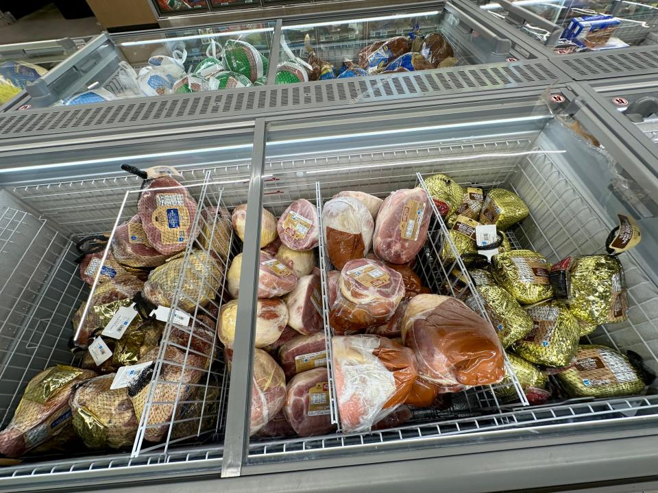 a freezer full of ham and turkey at aldi