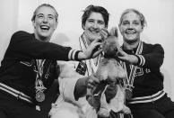 <p>The medalists of the 100 Meters Freestyle swimming event — silver medallist Sharon Stouder of the U.S.A., third-time gold medallist Dawn Fraser of Australia and bronze medallist Kathleen Ellis — pose with Fraser's lucky kangaroo mascot. </p>