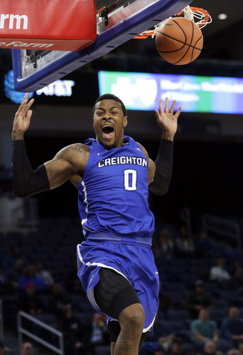 Creighton guard Marcus Foster reacts to a dunk against DePaul during the first half of an NCAA college basketball game Wednesday, Feb. 7, 2018, in Chicago. Foster scored 29 points to reach 2,000 for his college career.