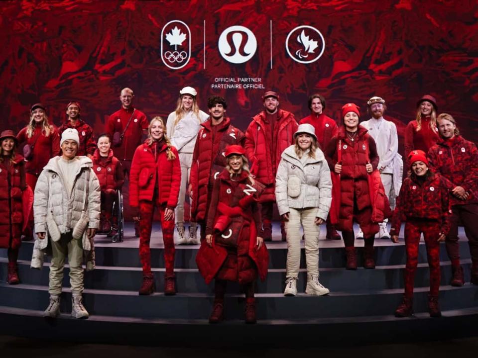 Canadian Olympian and Paralympians model the team's uniforms that will be worn for the opening and closing ceremonies of the Beijing Olympics and Paralympics next year. (COC - image credit)