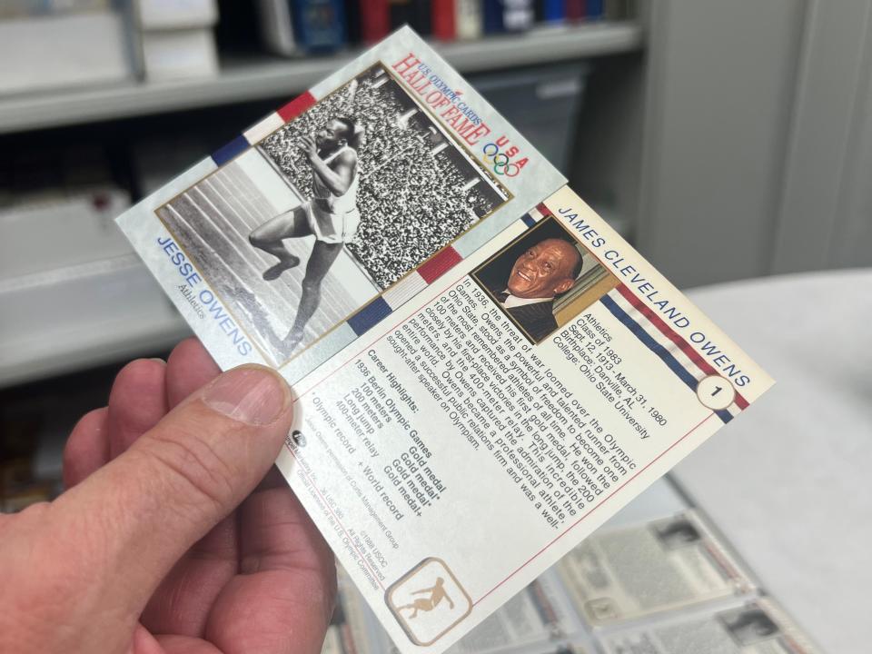 The front and back of a trading card for U.S. Olympian Jesse Owens. The cards are among the 88,500 in a collection that will be sold in a closed bid auction by the Center for Active Adults in South Lyon.