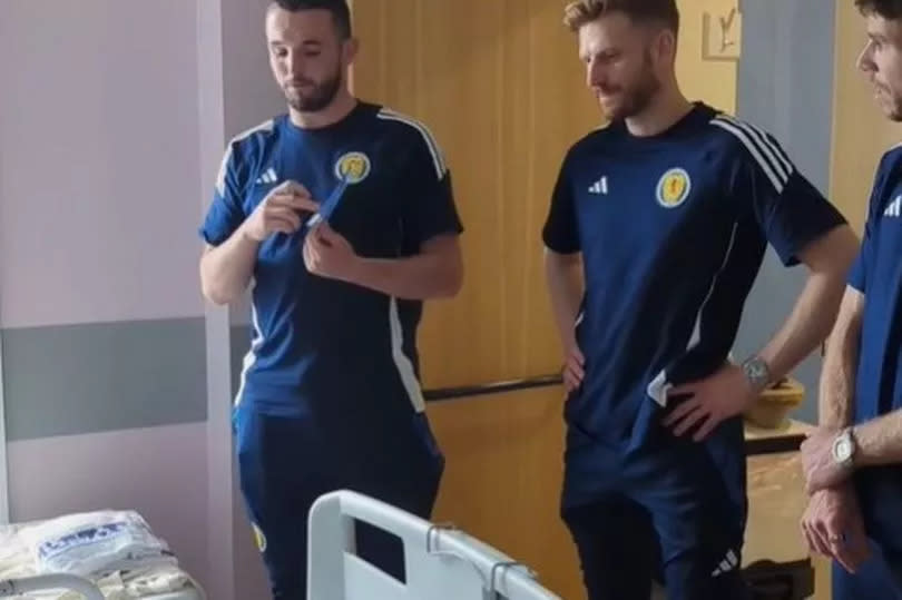 Super John and Stuart Armstrong at the hospital.