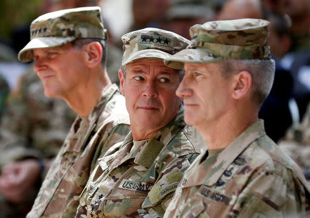 Incoming Commander of Resolute Support forces and command of NATO forces in Afghanistan, U.S. Army General Scott Miller (C) looks on during a change of command ceremony in Resolute Support headquarters in Kabul, Afghanistan September 2, 2018.REUTERS/Mohammad Ismail