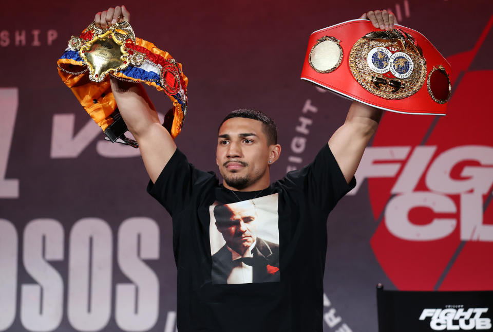 ATLANTA, GEORGIA - APRIL 16: Teofimo Lopez poses with his championship belts during a press conference for Triller Fight Club at Mercedes-Benz Stadium on April 16, 2021 in Atlanta, Georgia ahead of his June 5 lightweight title fight against George Kambosos Jr. (Photo by Al Bello/Getty Images for Triller)