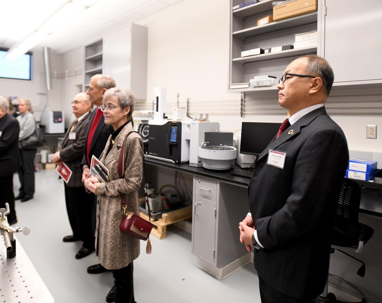 Yoshiaki Maeda, president of Shimadzu U.S., right, and other guests tour the Walsh University SPARQ Analytical Laboratory of Scientific Excellence following a dedication ceremony on Tuesday. The laboratory is equipment with nearly $1.2 million of Shimadzu Scientific Instruments. Timken Foundation helped fund the project.