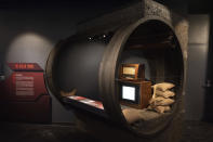 A mockup of the Berlin Tunnel the Central Intelligence Agency used for Operation Gold in on display in the refurbished museum in the CIA headquarters building in Langley, Va., on Saturday, Sept. 24, 2022. (AP Photo/Kevin Wolf)