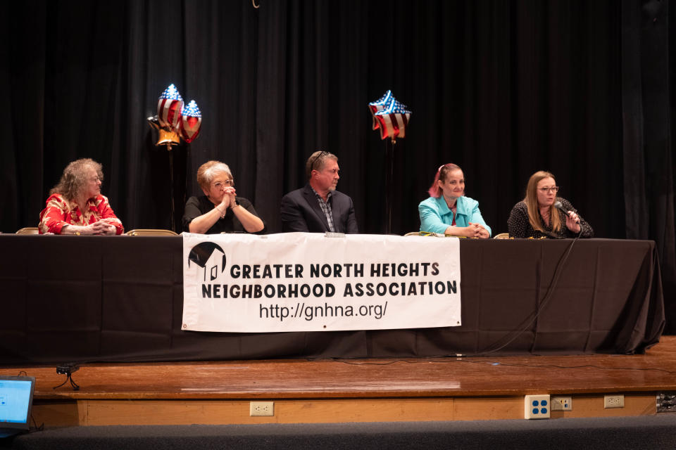 Candidates for Amarillo City Council Place 1 address the audience Monday night at the Greater North Heights Neighborhood Association candidate forum at Carver Elementary School in Amarillo.