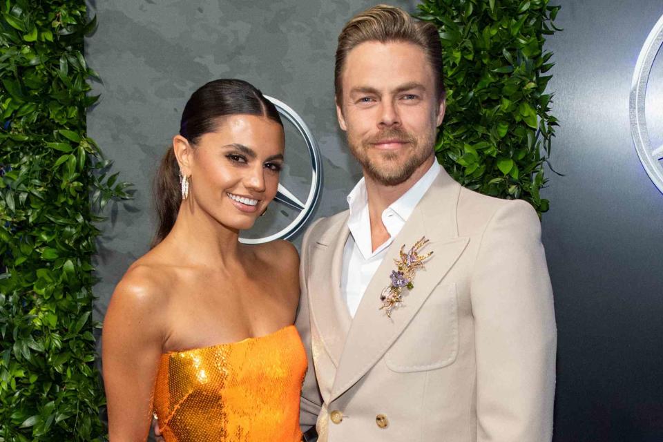 <p>Timothy Norris/FilmMagic</p> Hayley Erbert and Derek Hough arrive for the Mercedes-Benz Academy Awards viewing party on March 27, 2022 in Los Angeles, California.  