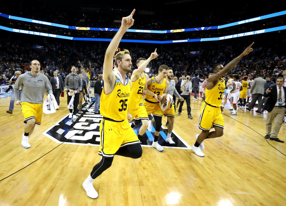 The UMBC Retrievers celebrate their 74-54 victory over the Virginia Cavaliers during the first round of the 2018 NCAA Men’s Basketball Tournament at Spectrum Center on March 16, 2018 in Charlotte, NC. UMBC became the first No. 16 seed to beat a No. 1 seed in tournament history. (Photo by Streeter Lecka/Getty Images)