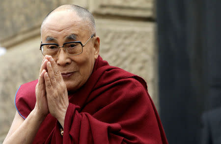 Tibet's exiled spiritual leader the Dalai Lama gestures during his visit in Prague, Czech Republic, October 17, 2016. REUTERS/David W Cerny