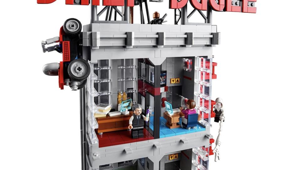 J. Jonah Jameson and Betty Brant's offices with them inside from LEGO's Daily Bugle set