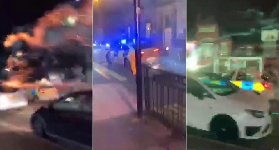 A police car came under attack from fireworks in Birmingham on Halloween night. (SWNS)