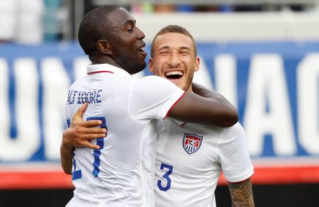 United States forward Jozy Altidore (17) is congratulated by defender Fabian Johnson (23) after Altidore scored against the Nigeria at EverBank Field. Mandatory Credit: Kim Klement-USA TODAY Sports