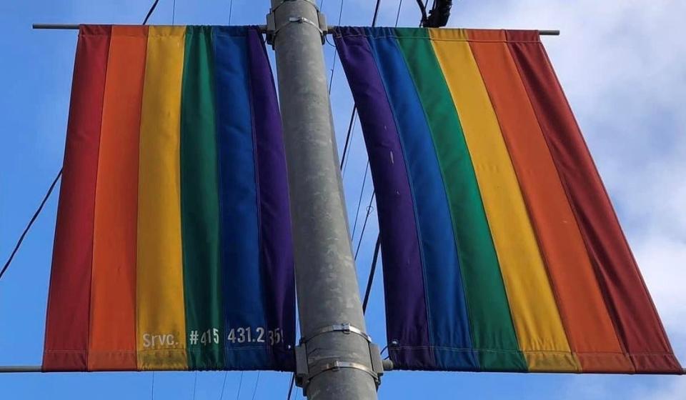Rainbow banners in San Francisco symbolize LGBTQ+ pride and social movements. The colors reflect the diversity of the LGBTQ+ community and the spectrum of human sexuality and gender.