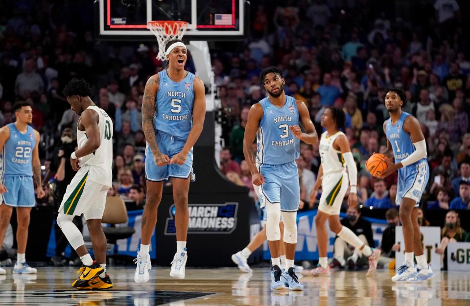 North Carolina Tar Heels forward Armando Bacot (5) celebrates defeating the Baylor Bears during the second round of the 2022 NCAA Tournament at Dickies Arena.