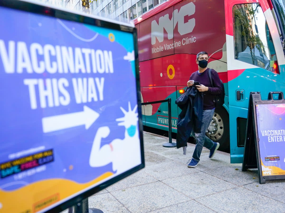 A mobile vaccination centre in New York City (AP)