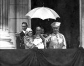<p>The Duke and Duchess of York with King George V and Queen Mary and Princess Elizabeth, on the balcony of Buckingham Palace (PA Archive) </p>