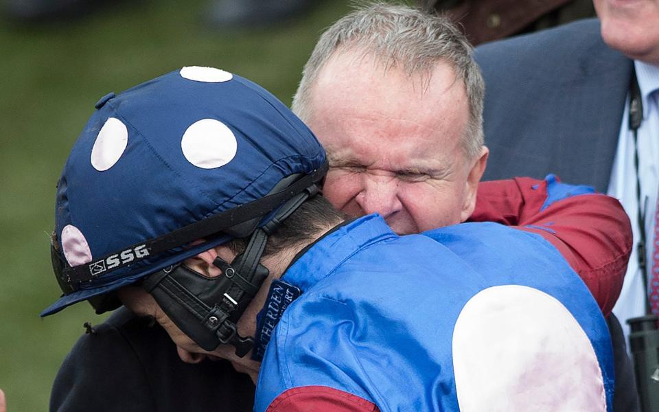 Paisley Park's owner, Andrew Gemmell, embraces the jockey Aidan Coleman after they won the Stayers' Hurdle on day three of the Cheltenham Festival - Â© Eddie Mulholland