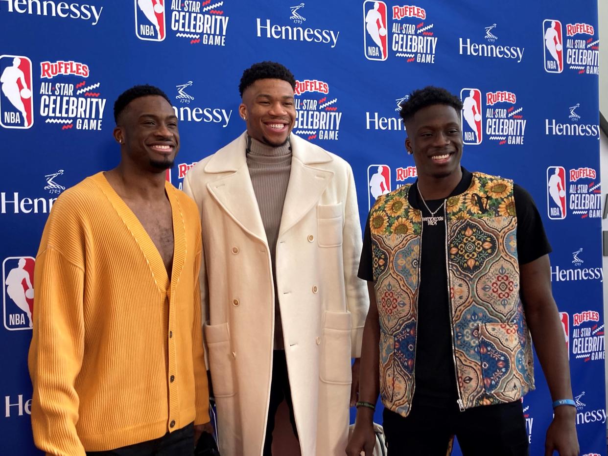 Thanasis, Giannis and Alex Antetokounmpo, shown at the 2023 NBA celebrity all-star game, along with brothers Kostas and Francis are opening a shop in downtown Milwaukee.