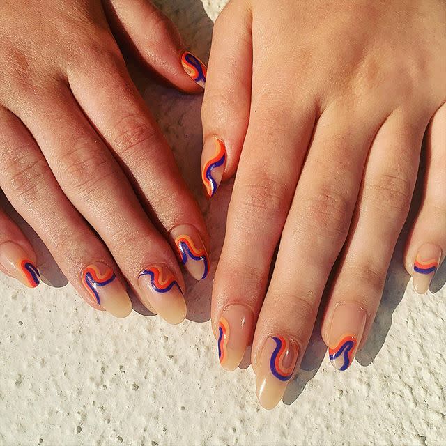 <p>60s nail art doesn't have to be OTT. Go for graphic waves on bare nails for a groovy take on negative space nails.</p><p><a href="https://www.instagram.com/p/CDedlDvD9Ta/?utm_source=ig_embed&utm_campaign=loading" rel="nofollow noopener" target="_blank" data-ylk="slk:See the original post on Instagram;elm:context_link;itc:0;sec:content-canvas" class="link ">See the original post on Instagram</a></p>